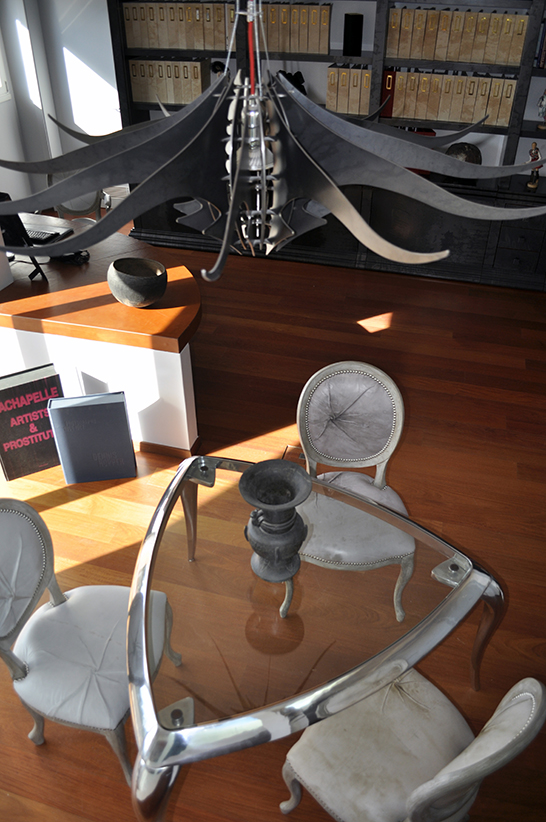 T-Table is a silver like table made with a kristall top