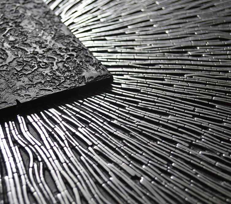 Basalto is a black monolith made of magma like decorative aluminium panels