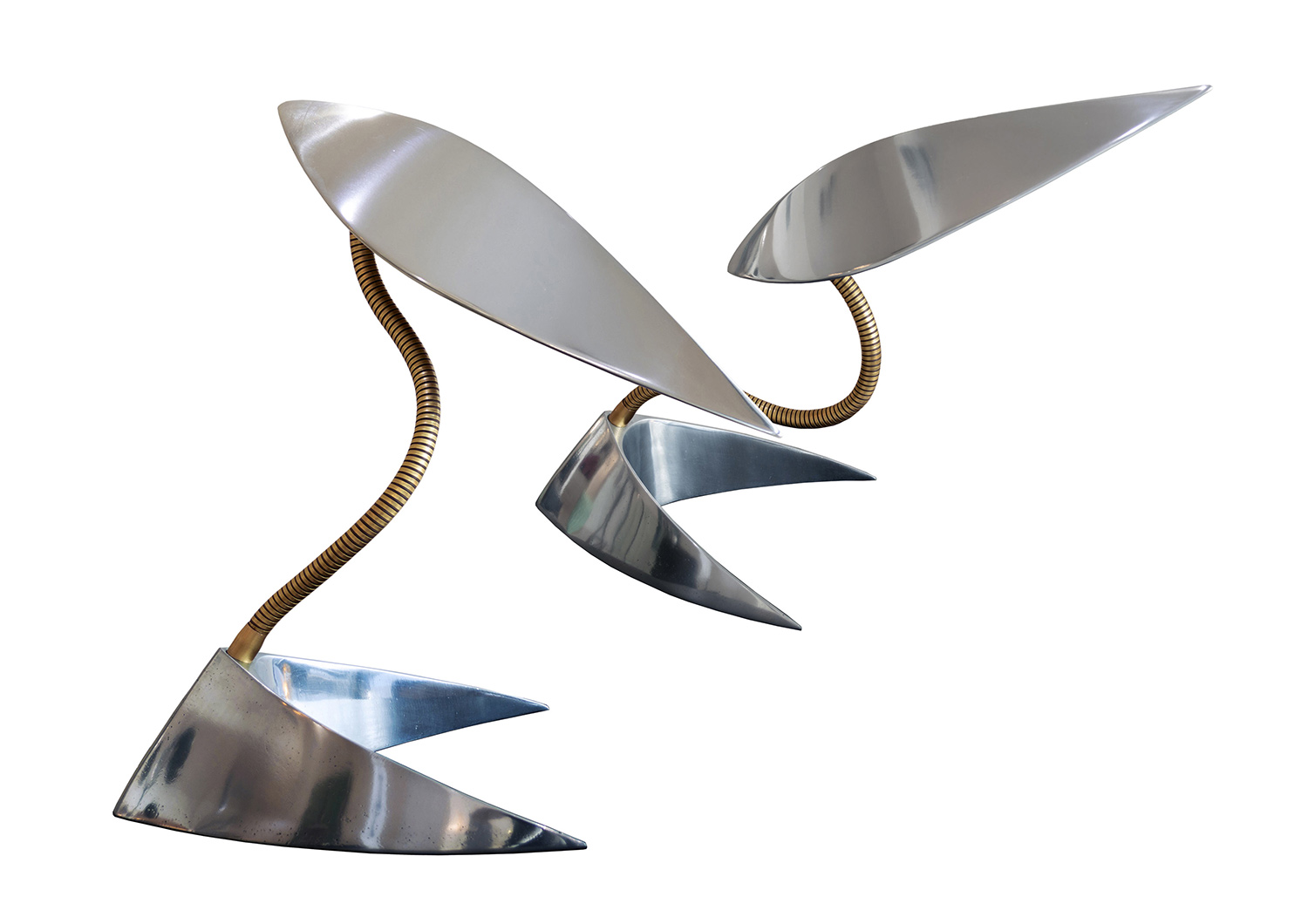 Kalimero is a table lamp made in polished aluminium and brass flexible neck