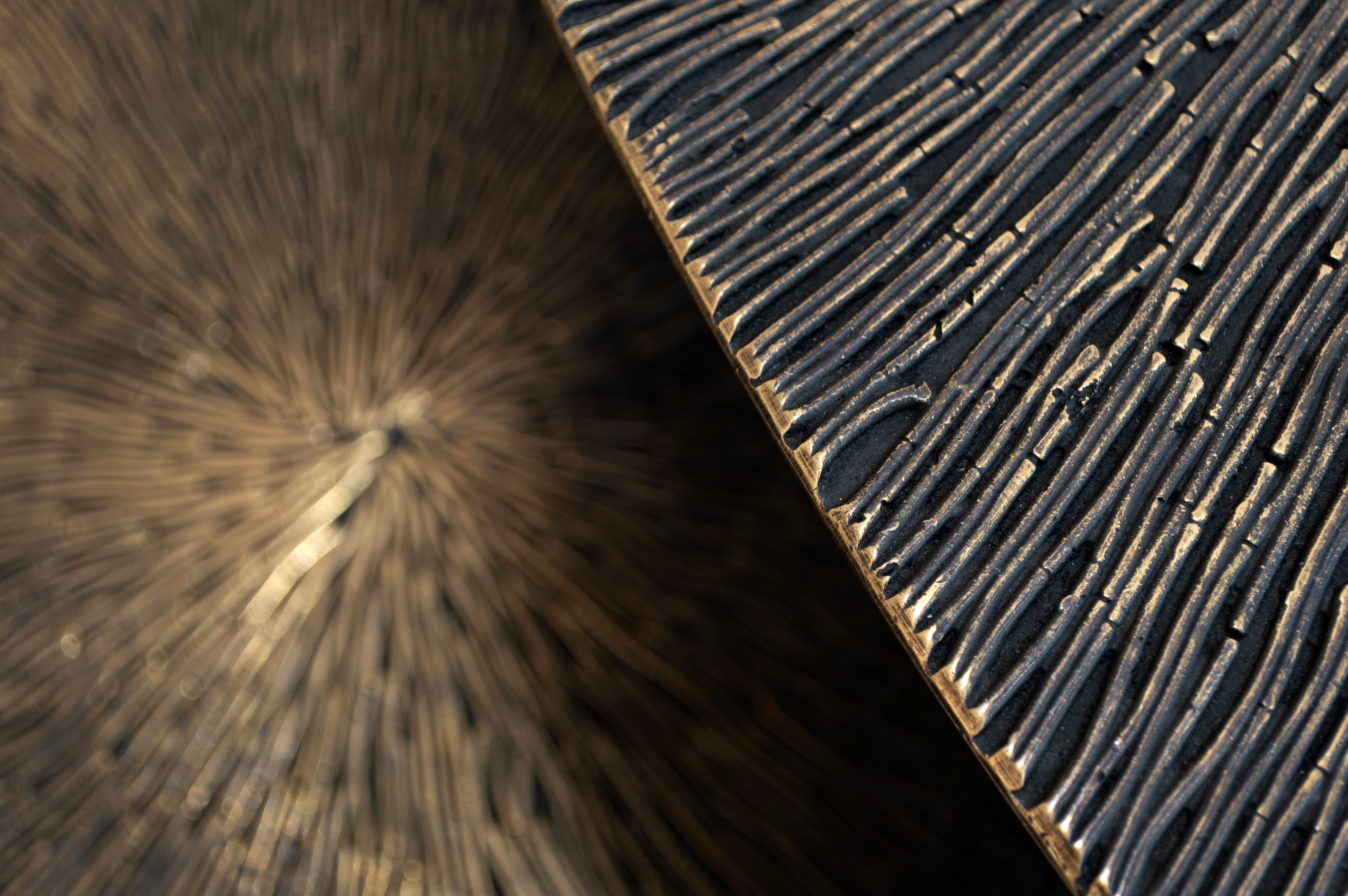 Cast bronze surface with patinated texture